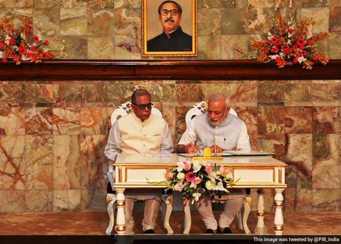 Prime Minister Narendra Modi signed the visitor book at the conferring of the Bangladesh Liberation War Honour on former PM Atal Bihari Vajpayee.