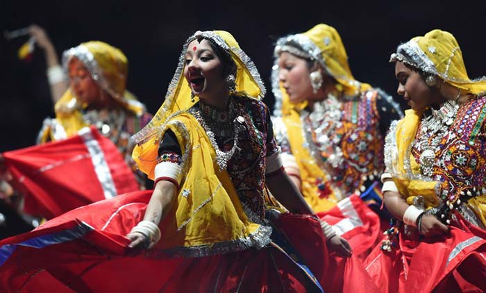 The dance troupes performed mainly to Bollywood songs. (Agence France-Presse Photo)