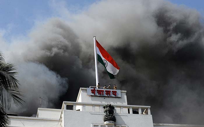 Most of the staff inside the building were evacuated after the fire broke out.(Photo courtesy: AFP)