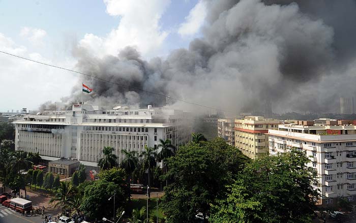 Smoke billows from the burning Mantralaya building, which houses the Maharashtra state secretariat, in Mumbai. (Photo courtesy: AFP)