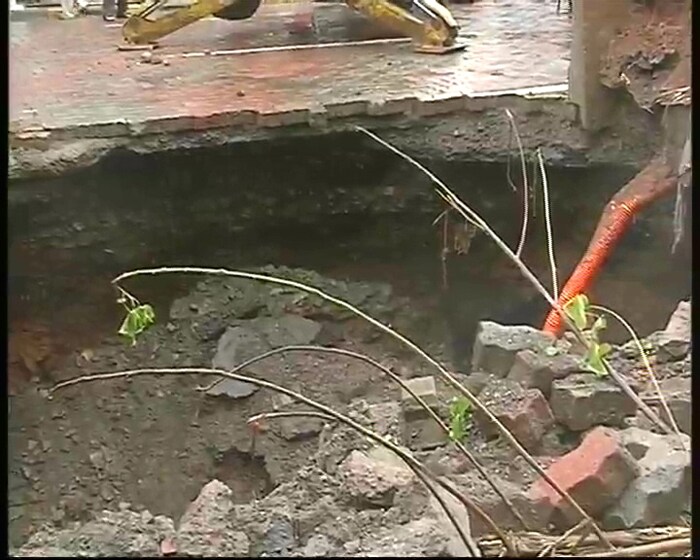 On Wednesday, the Anne Besant road in front of the old passport office in Worli, Mumbai, caved in causing a 20 ft wide and 15 ft deep hole in the middle of the road.