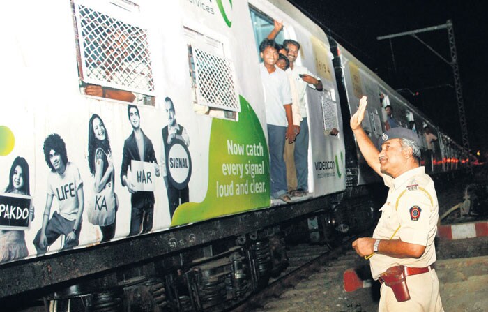 Policemen were on guard to prevent chaos among train commuters. (Image Courtesy: Mid-Day.com)