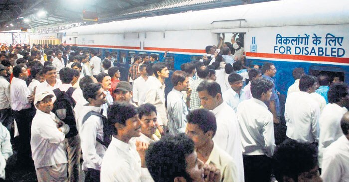 Many long-distance trains were stopping at some suburban stations to help out stranded passengers. (Image Courtesy: Mid-Day.com)