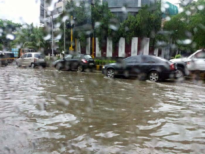 Mumbai rains hit trains, road traffic: Pictures on Twitter