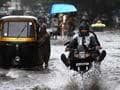 Photo : Rains hit rail, road traffic in Mumbai