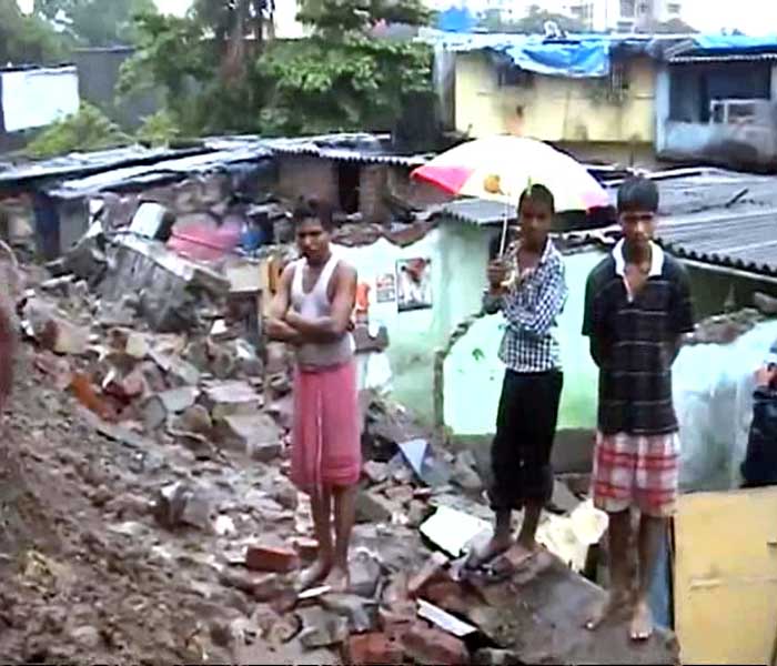 On the outskirts of Mumbai, in the Thane district a wall collapsed possibly due to the rain.