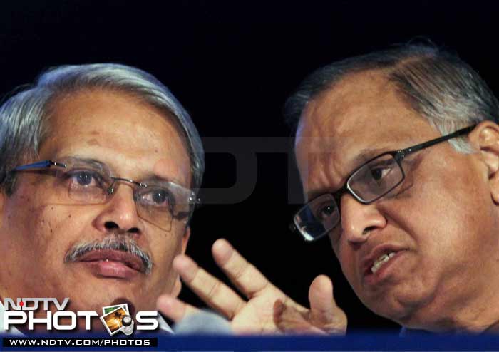 Co-Founder and COO S D Shibulal has been appointed as the new CEO, to take over from S Gopalakrishnan, who will now serve as Co-Chairman.<br><br> In this pic, Outgoing Infosys Chairman N R Narayan Murthy with CEO K Gopalakrishna. (PTI Photo)