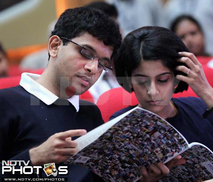 Outgoing Infosys Chairman N R Narayan Murthy's son Rohan Murthy with his wife at the company's 30th annual general meeting (AGM) in Bangalore on Saturday. (PTI Photo)