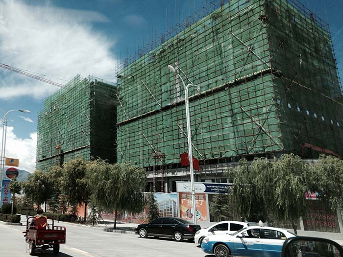 Buildings under construction in Lhasa. New buildings dominate the place and yet construction seems to go on unabated.