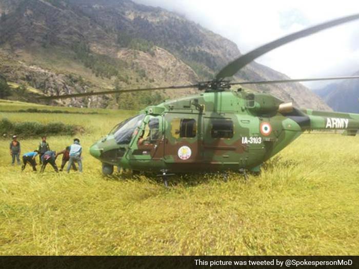 Nepal Earthquake Rescue Effort: Hindustan Aeronautics Limited's Advanced Light Helicopter (ALH) - Dhruv, being flown by Army Aviation in action at Barpak, Laprak, and Uiya near Gorkha town.