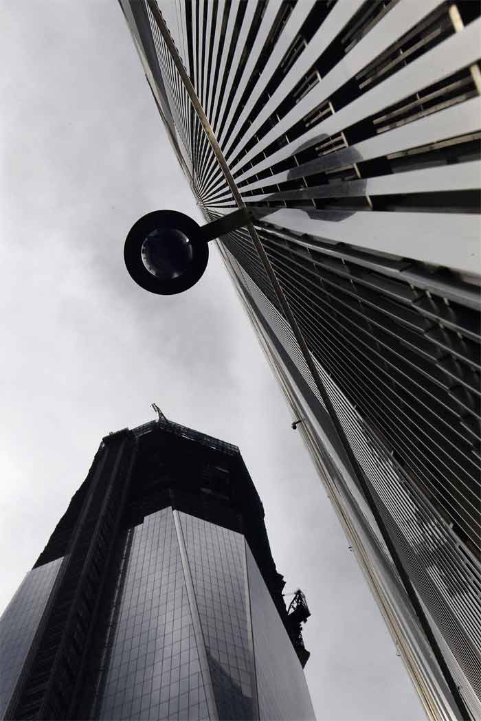 A surveillance camera hangs next to One World Trade Centre. Heightened security for the anniversary commemoration will include hundreds of surveillance cameras at the site. (AFP Photo)