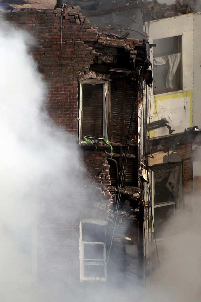 Two multiple-dwelling buildings collapsed after an explosion that left at least two dead and 17 injured in the Harlem neighborhood of Manhattan on March 12, 2014.