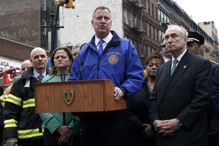 New York Mayor Bill de Blasio speaks during a press conference to report on the building collapse.