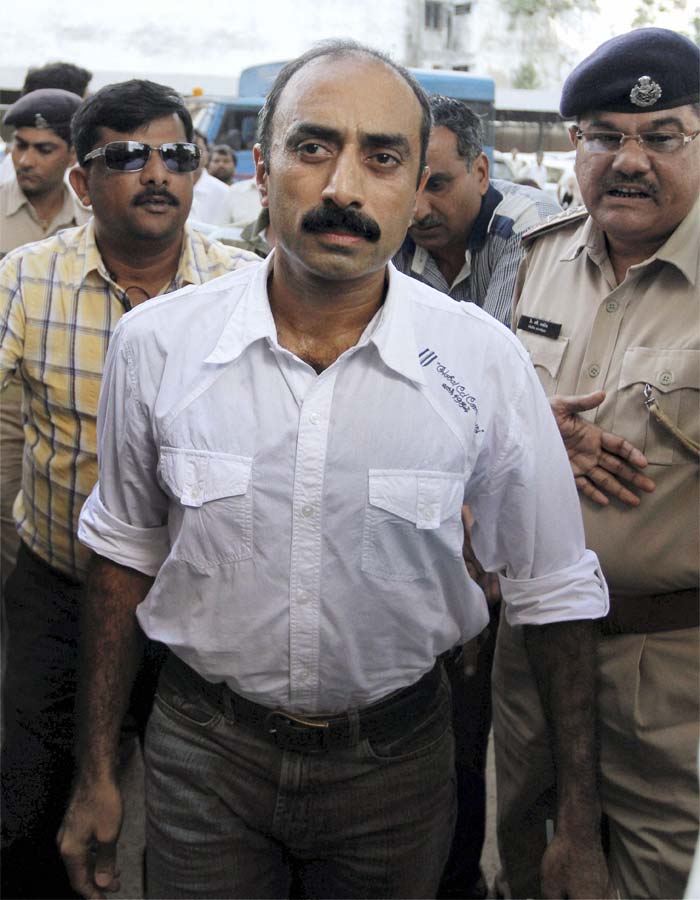 <b>Sanjiv Bhatt:</b> Hailed by many as a whistleblower, Gujarat top cop Sanjiv Bhatt hogged national headlines after he took on Chief Minister Narendra Modi, accusing the latter of complicity in the 2002 post-Godhra riots. The Indian Police Service (IPS) officer claimed to be present at a meeting on February 27, 2002 where Mr Modi allegedly advised senior cops to go slow on the rioters. A suspension, arrest and subsequent bail later, Bhatt remains unfazed and firm in his fight against the Modi government.