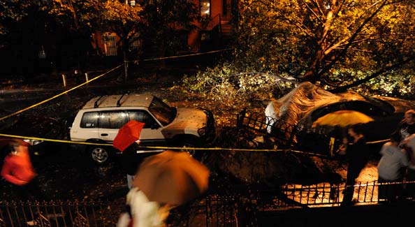 Long Island Rail Road officials said that crews were working through the night to remove debris from tracks, and they hoped to have most service restored for the morning rush hour Friday, but warned of scattered delays, and said service would continue to be suspended on the Port Washington line. <br><br>(NYT Photo)