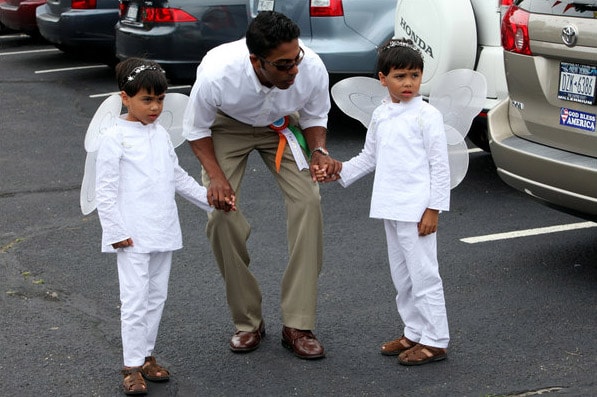 Two young angels receive their instructions. (NYT Photo)