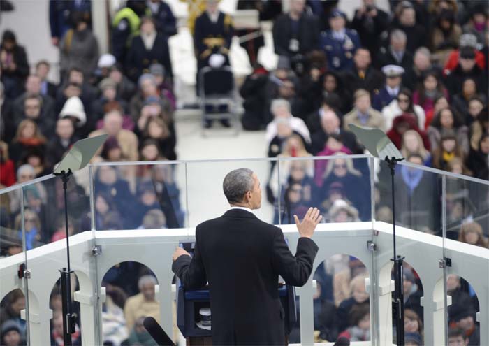 The president was earlier announced with a peal of trumpets and walked down the steps from the iconic building to a huge cheers of "Obama, Obama" from a vast crowd stretching into the distance down the National Mall below.</br></br>
Image courtesy: AFP