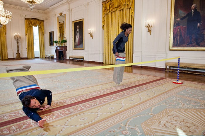 January 25, 2012<br><br>
"Chuck Kennedy made this amusing photograph of First Lady Michelle Obama participating in a potato sack race with Jimmy Fallon in the East Room of the White House during a ?Late Night with Jimmy Fallon? taping for the second anniversary of the "Let's Move!" initiative." <br><br>(Official White House Photo by Chuck Kennedy)<br><br> This image is one of 83 behind-the-scenes photos released by The White House