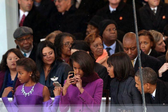 Obamas\' kiss captured by daughters Sasha and Malia on cellphones