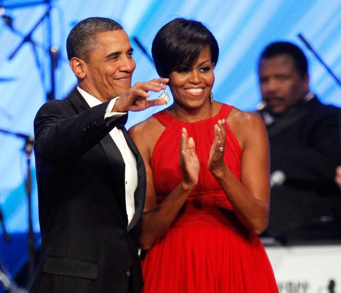 Finally, with her movie star glam style streak Michelle proved that her popularity lied in her individuality. She could steal an entire show even with the President standing by her side. (AP Photo)