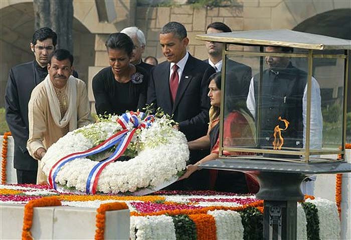 President Barack Obama, and First Lady Michelle Obama lay a wreath at Raj Ghat, a memorial to Mahatma Gandhi, in New Delhi, India, Monday, Nov. 8, 2010. (AP Photo)