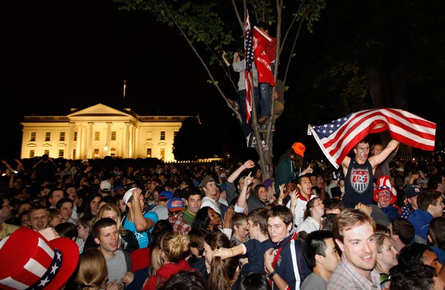 Crowds gather outside the White House in Washington early Monday, May 2, 2011, to celebrate after President Barack Obama announced the death of Osama bin Laden. (AP Photo/Charles Dhara)