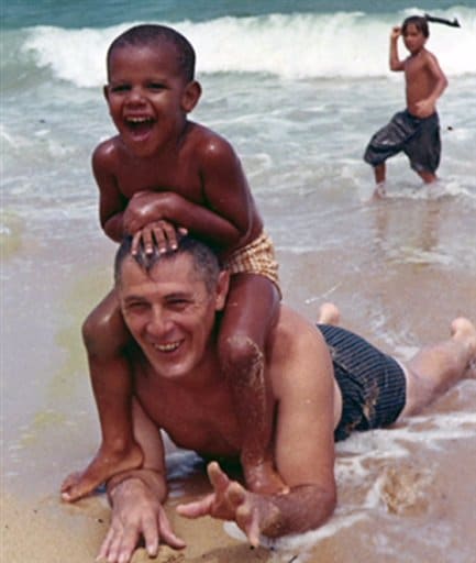 <b>Joy of life: </b> This photo provided by the presidential campaign of Barack Obama, D-Ill, shows the US President, Barack Obama, on the beach with maternal grandfather, Stanley Armour Dunham.