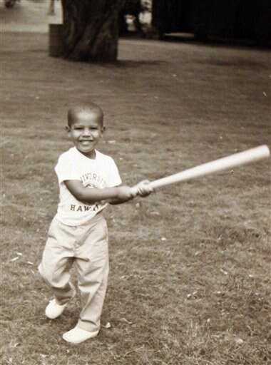 <b>First Innings: </b> This 1960's photo of Obama's childhood provided by the presidential campaign of Barack Obama, D-Ill,  features him playing with his baseball bat in Hawaii.