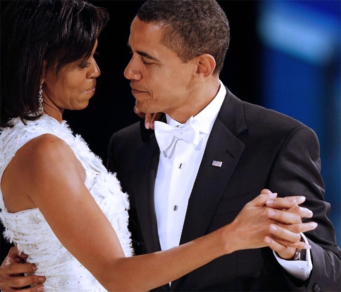 <b>Having a 'Ball': </b>In this picture, Barack Obama is shown dancing with wife Michelle at the Western Ball, one of several inaugural balls in Washington, Jan. 20, 2009. (NYT Photo)