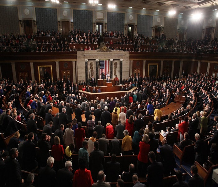 Seen here--Obama receiving a standing ovation from the audience after he delivered his first State of the Union address that focussed on creating new jobs for the US citizens and over hauling the US Health care system, amongst other objectives on his agenda.(NYT Photo)