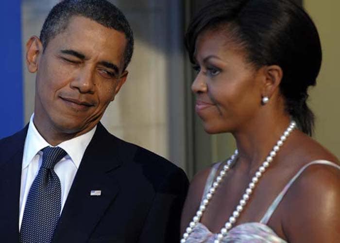 US President Barack Obama and First Lady Michelle Obama wait to welcome world leaders to the G20 dinner at the Phipps Conservatory on Thursday in Pittsburgh, Pennsylvania. (AFP Photo)