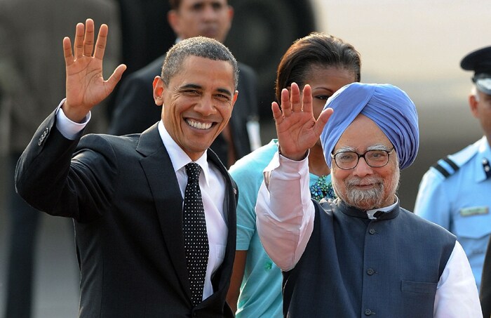 US President Barack Obama arrived in Delhi on the second leg of his four-day visit to India and was personally received by Prime Minister Manmohan Singh who set aside protocol to welcome the guest.<br><br>US President Barack Obama and First Lady Michelle landed in New Delhi after completing the Mumbai leg of their visit which saw successful interactions with business leaders, youth and school students in the city.(AFP Photo)