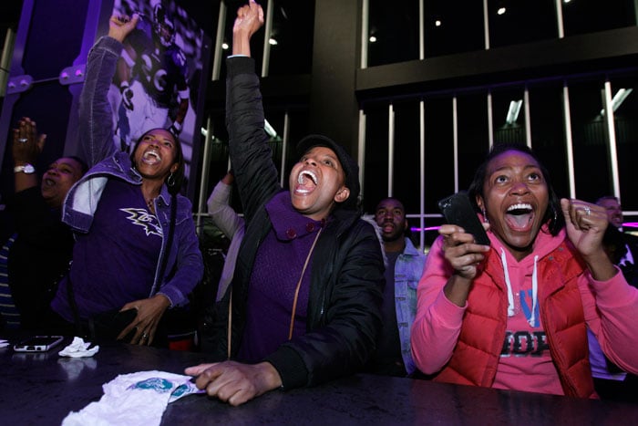 Barack Obama will return for a second term as President of USA. Supporters receive the news with joy and elation.