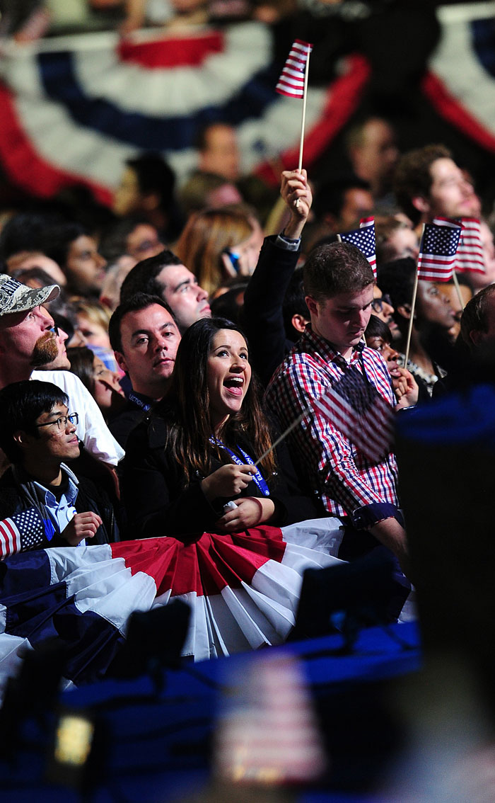 In New York's Times Square, ear-splitting grins punctuated by sombre faces ? Romney supporters?