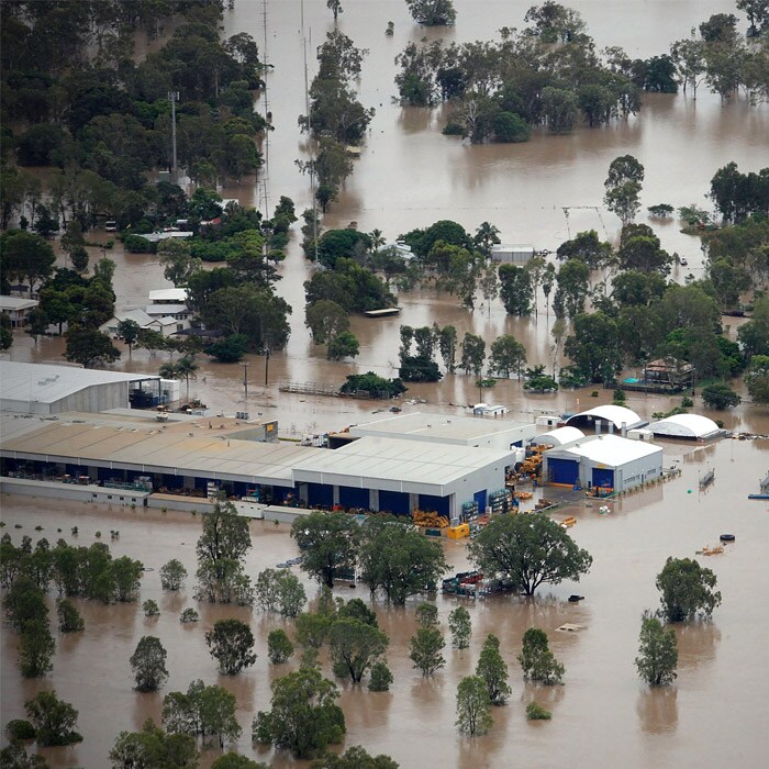 <b>Submerged:</b> A rural industrial area, south of Rockhampton, Australia, is overwhelmed by floodwaters Thursday, Jan. 6, 2011. (AP Photo)
