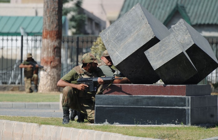 Securtity forces immediately cordoned off the area, bringing traffic to a standstill as the firing began. (AFP Photo)