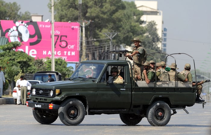 The gunmen also lobbed five grenades at the Army Headquarters. (AFP Photo)