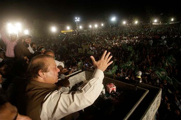 Pakistan's former Prime Minister Nawaz Sharif, addresses his supporters during an election campaign rally, in Lahore, Pakistan, Thursday, May 9, 2013.