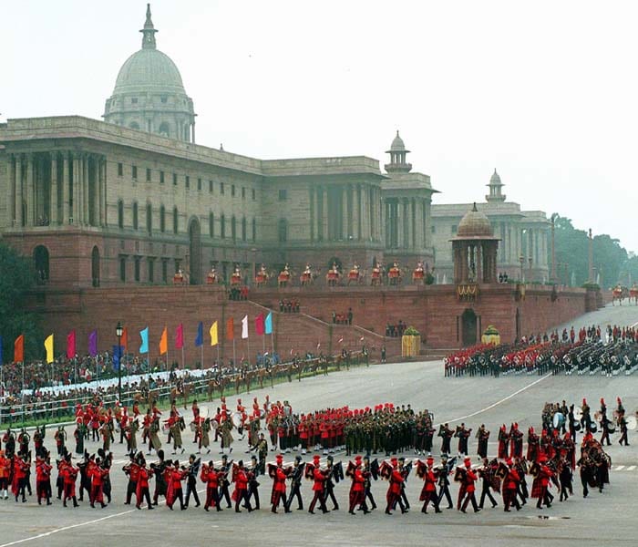 Every year a grand parade is held from Rashtrapati Bhawan, along Rajpath, to the historic Red Fort.<br><br>Prior to its commencement, the Prime Minister lays a floral wreath at the Amar Jawan Jyoti-a solemn reminder of the sacrifice of the martyrs who died for the country in the freedom movement and succeeding wars of defence of sovereignty of the country.
 

The President then arrives in his motorcade accompanied by a notable Foreign Head of the state, who is the Chief Guest at the celebrations. <br><br>Soon afterwards, a 21 gun salute is presented and the President unfurls the national flag as the National Anthem is played. This marks the beginning of the parade.(AFP Photo)