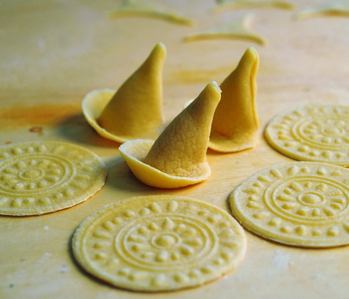 <p>According to her, the history of pasta is also the history of conquest. The orecchiette of Puglia, &quot;little ears&quot; that lovingly show their makers' thumbprints, date back to the 13th-century domination of Southern Italy by the Angevins of France. </p>
<p>&quot;They resemble the crosets of Provence, which are still made in Piedmont with the same name.&quot;she writes. (NYT Newsservice)</p>