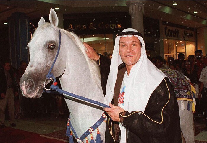 In an attempt to get over his alcoholism, Swayze withdrew from showbiz and spent time breeding horses. His best-known horse was Tammen, a chestnut Arabian stallion. (Photo: AFP)