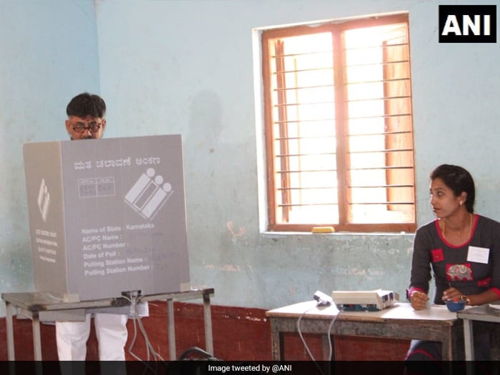 Karnataka Minister DK Shivakumar cast his vote at a polling booth in Dodda Halahalli, Kanakapura Taluka today.