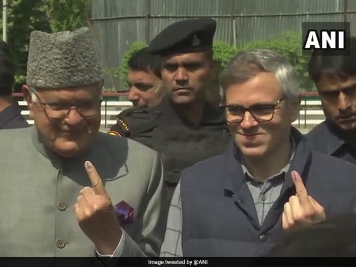 National Conference's Farooq Abdullah and Omar Abdullah cast their votes at a polling station in Munshi Bagh Area in the Srinagar Lok Sabha constituency. Omar Abdullah said, "Now that Lok Sabha polls are due to conclude, we can only hope that Centre together with EC gives people of Jammu and Kashmir an elected government which is their right."