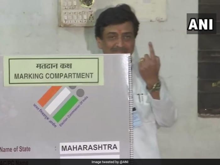 Maharashtra Congress chief and sitting parliamentarian from Nanded, Ashok Chavan, cast his vote at a polling station in Nanded parliamentary constituency in the state.