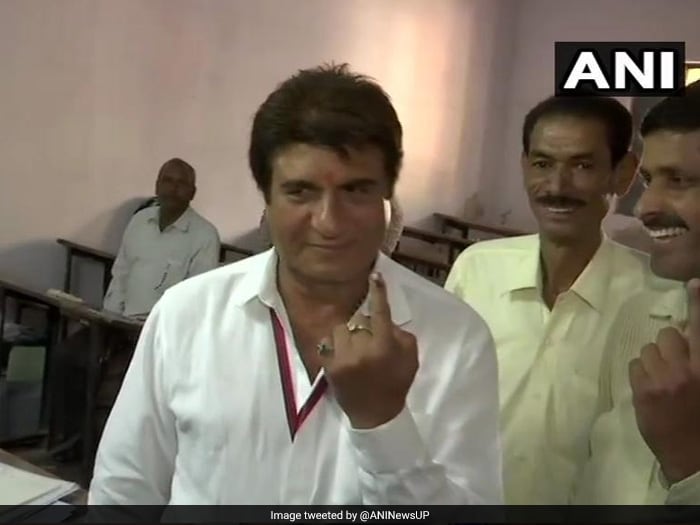 Uttar Pradesh Congress chief Raj Babbar and party's candidate from Fatehpur Sikri cast his vote at the polling booth in Radha Ballabh Inter College in Agra.