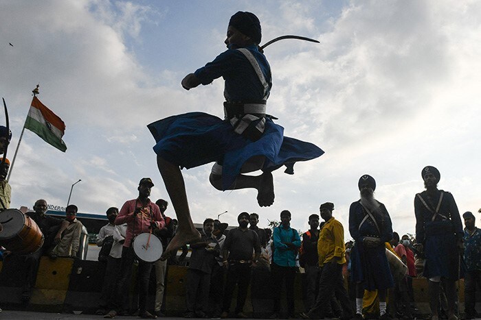Sikh devotees performs \'Gatka\' an ancient form of Sikh martial art during a religious procession.
