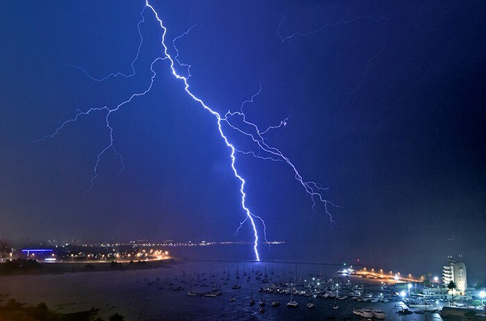 A lightning bolt strikes near the Uruguayan Yacht Club during a thunderstorm in Montevideo.