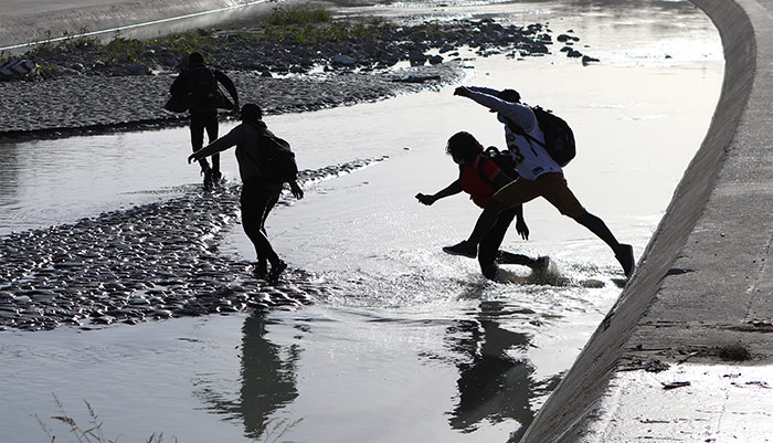 Haitian migrants cross the Rio Bravo to seek political asylum in the US, in Ciudad Juarez, Chihuahua state, Mexico.