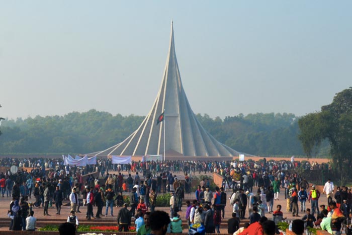 People gather to pay their respects at the 1971 independence war's martyrs national memorial to celebrate the 50th Victory Day in Bangladesh.