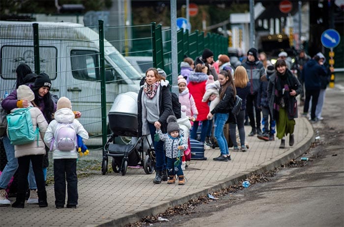 Ukrainian women and children are seen after crossing the Slovak-Ukrainian border to leave Ukraine in Ubla, eastern Slovakia.